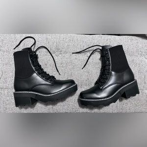 Black chunky boots with knit back. Combat style